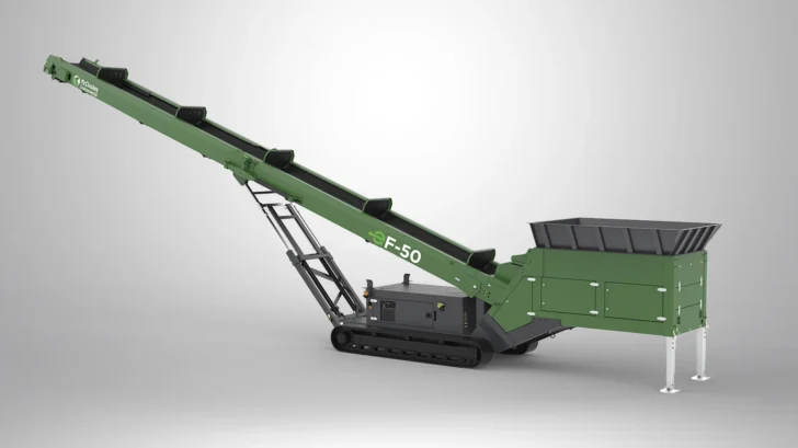EF-50 tracked feeder stacker with raised conveyor, support frame, and hopper for mobile stockpiling.
