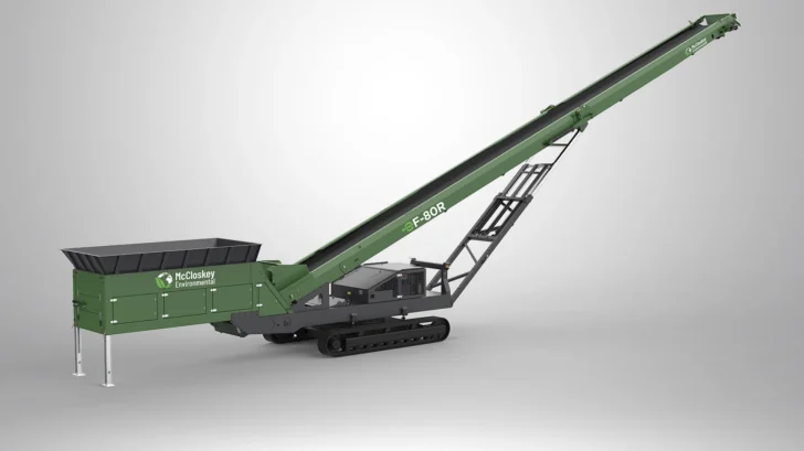 Side profile of the Radial Stacker showing the elevated 80′ conveyor, feeder hopper, support frame, and crawler tracks.