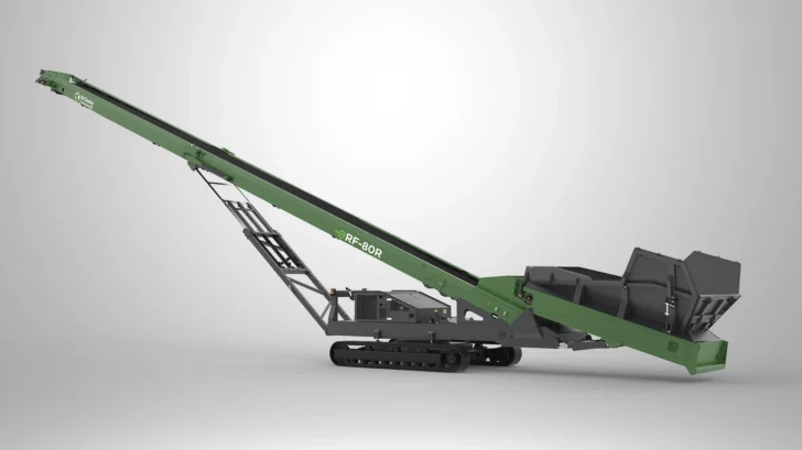 McCloskey rear-feed stacker with hopper and tracked undercarriage