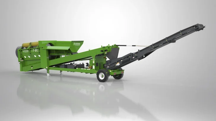 Side view of the ET-512R Trommel showing the heavy-duty screening drum, feed hopper, wheels, and extended radial conveyor.