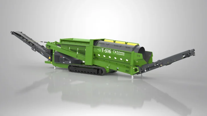 Rear side view of the ET-516RT Trommel showing the tracked undercarriage, screening drum, and extended discharge conveyors.