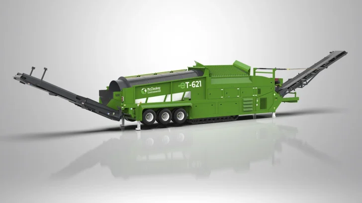 Side profile of the McCloskey Trommel with extended conveyors and heavy-duty drum section.