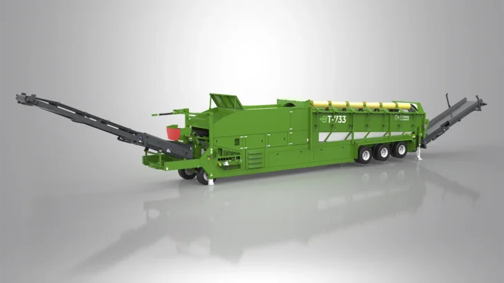 Rear angle view of the ET-733RE Trommel with oversize end conveyor and hydraulic folding stockpiling conveyors.